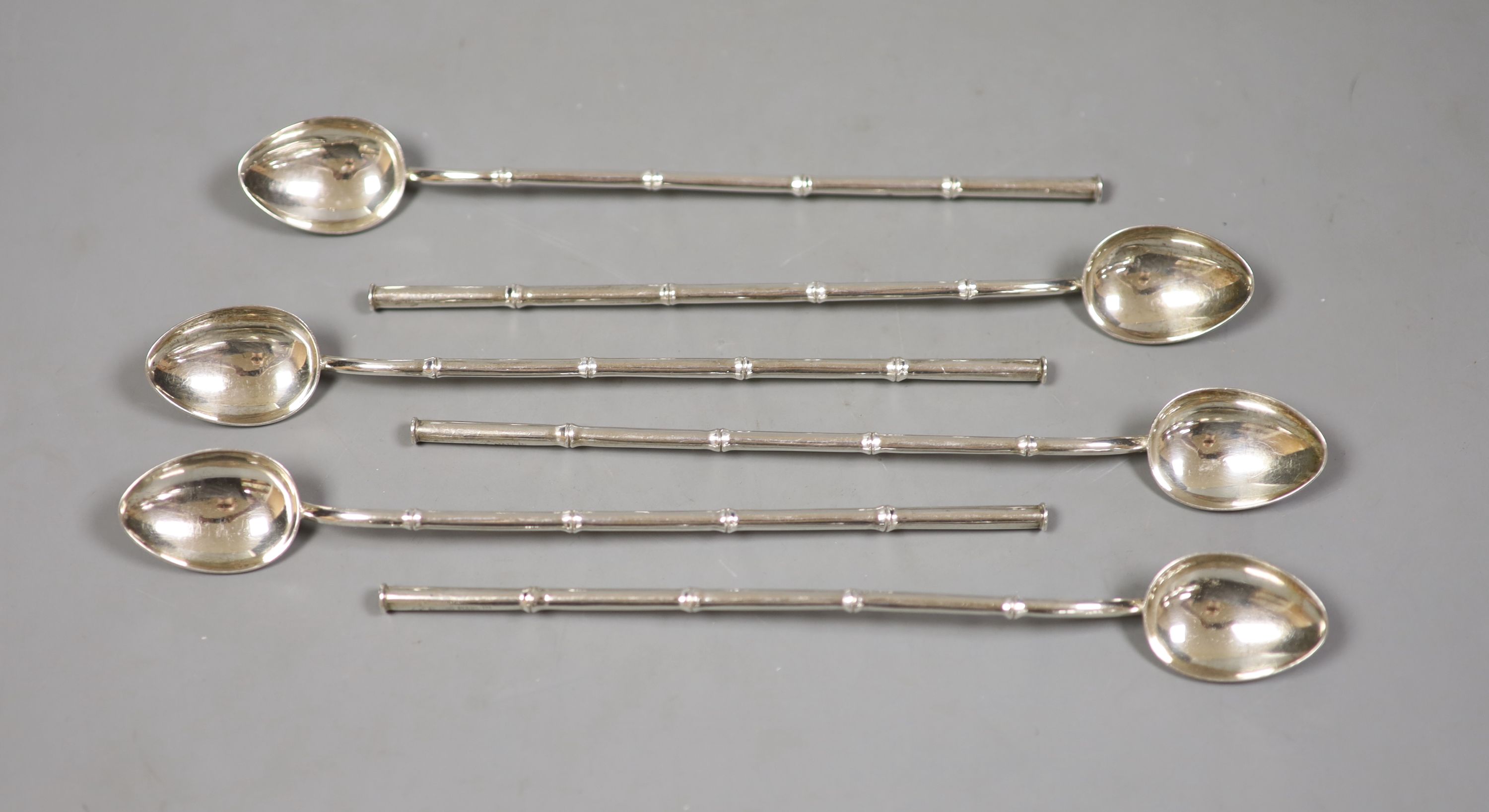 A set of six Hong Kong export white metal (stamped sterling silver) sundae spoons, 19.5cm, 101 grams.